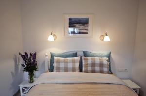 Llit o llits en una habitació de Smėlynas Neringa Apartments
