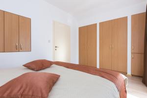 Postel nebo postele na pokoji v ubytování Apartman Ivona