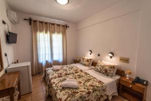 Postel nebo postele na pokoji v ubytování Hotel Sylvia