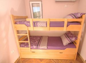 Postel nebo postele na pokoji v ubytování Apartments Bellavista