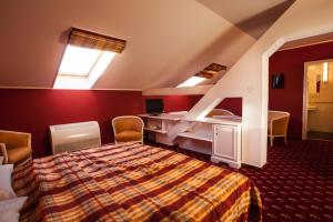 Postel nebo postele na pokoji v ubytování Park Hotel Tartuf