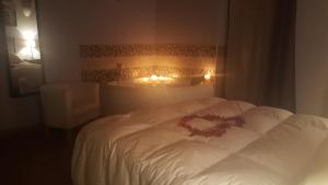 En eller flere senge i et værelse på Loboratorio Rural-La Sonrisa del Aire