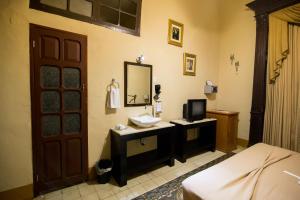 Postel nebo postele na pokoji v ubytování El Gran Hotel