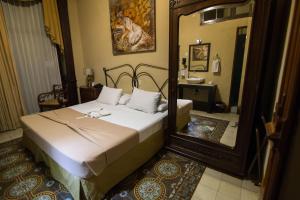 Postel nebo postele na pokoji v ubytování El Gran Hotel