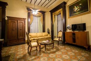TV a/nebo společenská místnost v ubytování El Gran Hotel