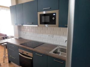 Kuchyňa alebo kuchynka v ubytovaní DREAMSUITES MARIN GARCIA.