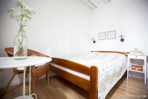 Postel nebo postele na pokoji v ubytování Willa Rogowskich