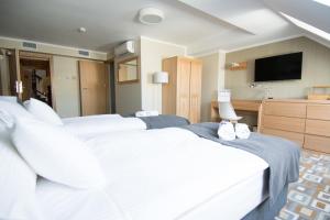Ένα ή περισσότερα κρεβάτια σε δωμάτιο στο Provincja Winebar & Rooms