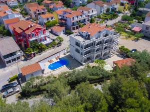 an aerial view of a city with houses at Apartmani Mariva in Vodice
