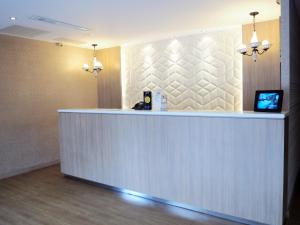 TV i/ili multimedijalni sistem u objektu The Riverside Hotel Hengchun