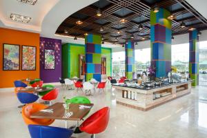 A restaurant or other place to eat at ibis Styles Cikarang