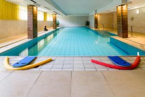 Bazén v ubytování Michels Hanseatic Hotel Norderney nebo v jeho okolí