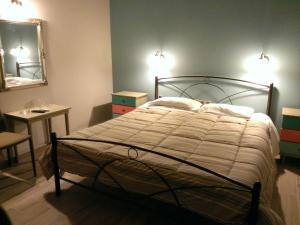 A bed or beds in a room at Artemis
