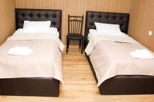 Letto o letti in una camera di Hotel New Telavi