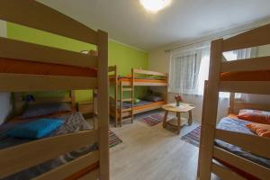 Postel nebo postele na pokoji v ubytování Guesthouse Adi