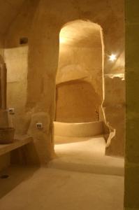 Voodi või voodid majutusasutuse L'Hotel In Pietra toas