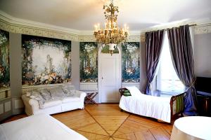 Postel nebo postele na pokoji v ubytování La Villa Palladienne - Château de Syam + 8 fotografií