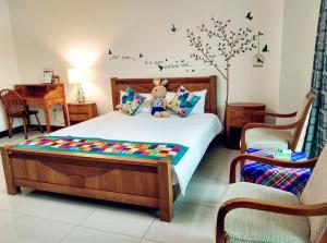 Letto o letti in una camera di Tainan Yi Home