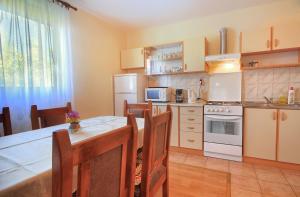 Kuchyň nebo kuchyňský kout v ubytování Apartments Sabljak