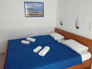 Postel nebo postele na pokoji v ubytování Rooms Ntontas