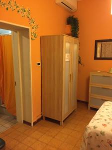 Postel nebo postele na pokoji v ubytování Corte Posta B&B - parcheggio e bagno in camera