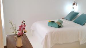 Postel nebo postele na pokoji v ubytování Loro Verde + 55 fotografií