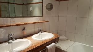 Koupelna v ubytování Hotel Mozart