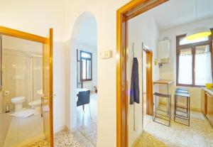 a bathroom with a sink and a toilet in a room at DolceVita Apartments N 331 in Venice +5 photos