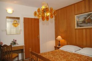 Postel nebo postele na pokoji v ubytování Guesthouse Mimas