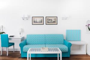A seating area at Hotel Villa Garden
