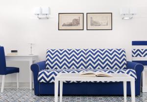 A seating area at Hotel Villa Garden