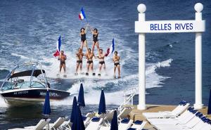 a group of people on a boat on the water at H&ocirc;tel Belles Rives in Juan-les-Pins