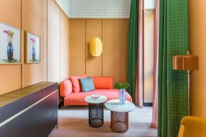 A seating area at Room Mate Collection Giulia, Milan