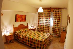 A bed or beds in a room at Azucena