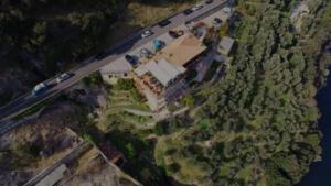 an aerial view of a house and a road at Hotel La Terrazzina in Gargnano