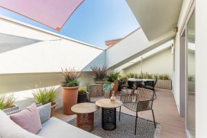 A seating area at Room Mate Collection Giulia, Milan
