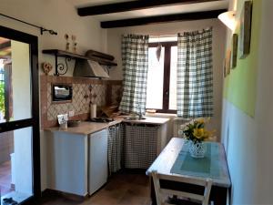 Kuchyňa alebo kuchynka v ubytovaní Agriturismo San Giacomo