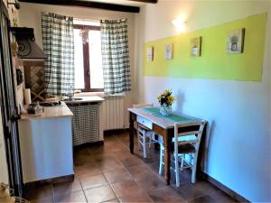 Kuchyňa alebo kuchynka v ubytovaní Agriturismo San Giacomo