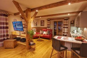 Posezení v ubytování Holzhaus Lugerhof