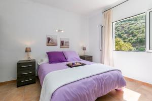 Postel nebo postele na pokoji v ubytování Town House Cas Decu