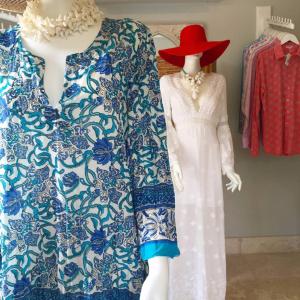 a dress and hat on mannequins in a store at Cobblers Cove - Barbados in Saint Peter