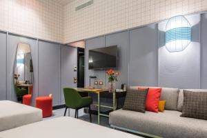 A seating area at Room Mate Collection Giulia, Milan