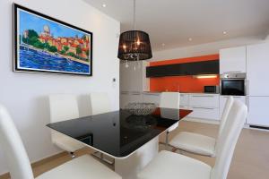 Kuchyň nebo kuchyňský kout v ubytování Villa Summer Dreams Apartments