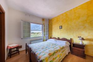 Postel nebo postele na pokoji v ubytování Agriturismo Quercetelli