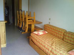 A bed or beds in a room at studio gresse en vercors