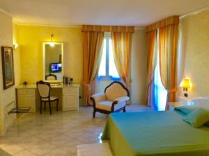 Ένα ή περισσότερα κρεβάτια σε δωμάτιο στο Hotel Villa Leri