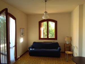 Ein Sitzbereich in der Unterkunft Holiday Home Recanati