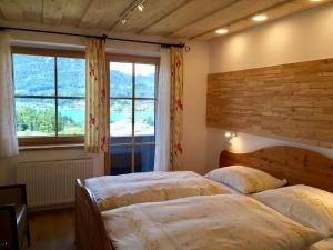 Uma cama ou camas num quarto em Haus Lisa
