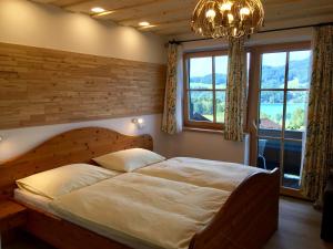 Uma cama ou camas num quarto em Haus Lisa