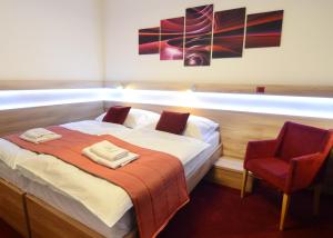 Posteľ alebo postele v izbe v ubytovaní Hotel Uno